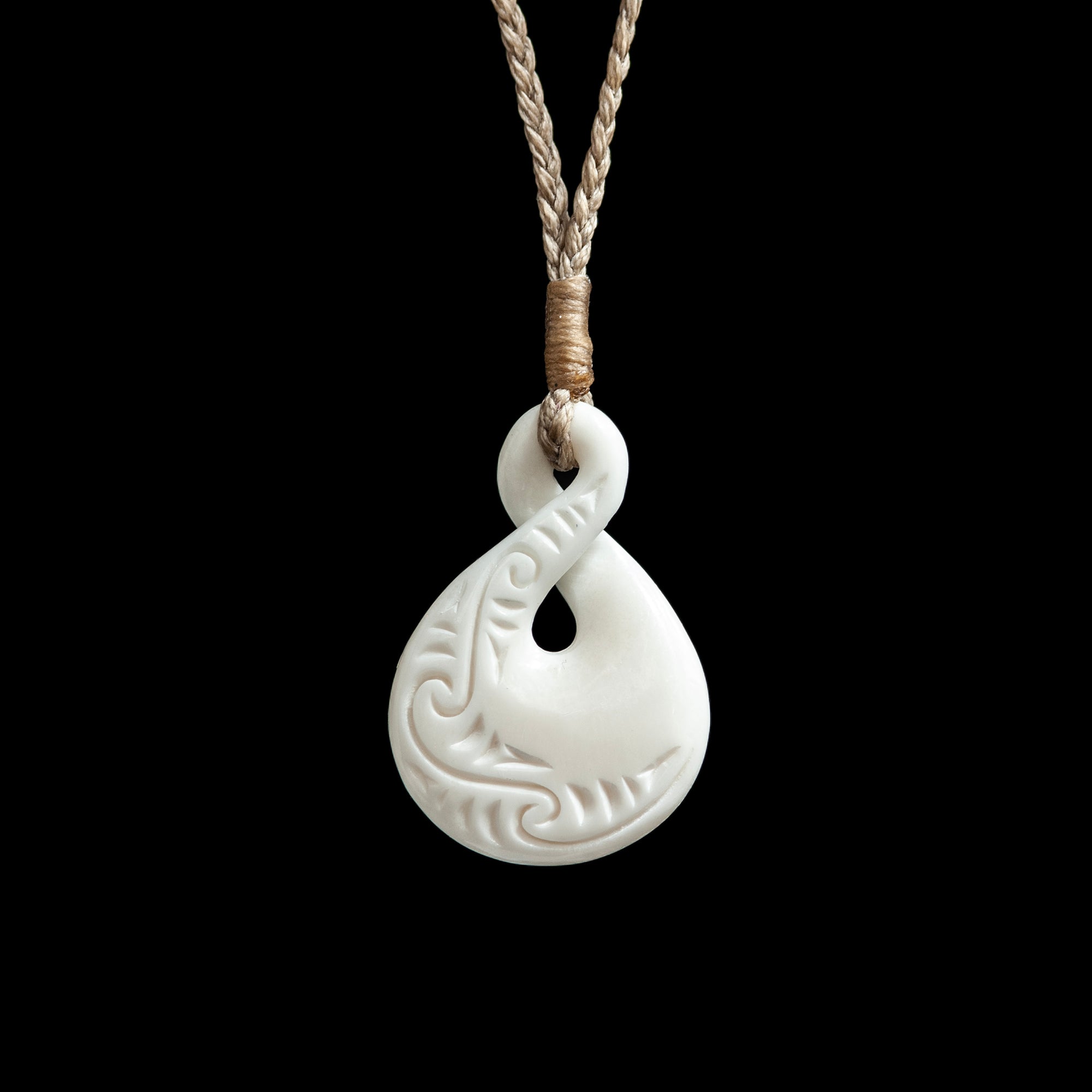 Small Carved Pikorua Twist, handcrafted bone pendant with plaited cord-0