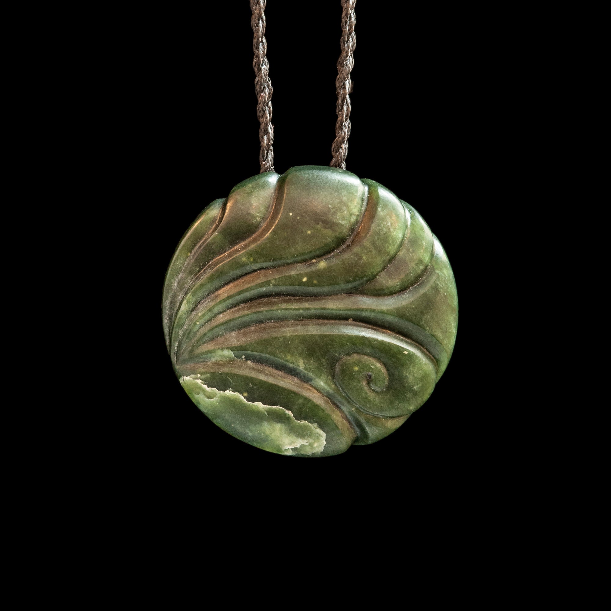 Hand carved Jade disc pendant with korus by Nick and Mady-0