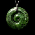 Pounamu notched Koru, handcrafted jade pendant-0