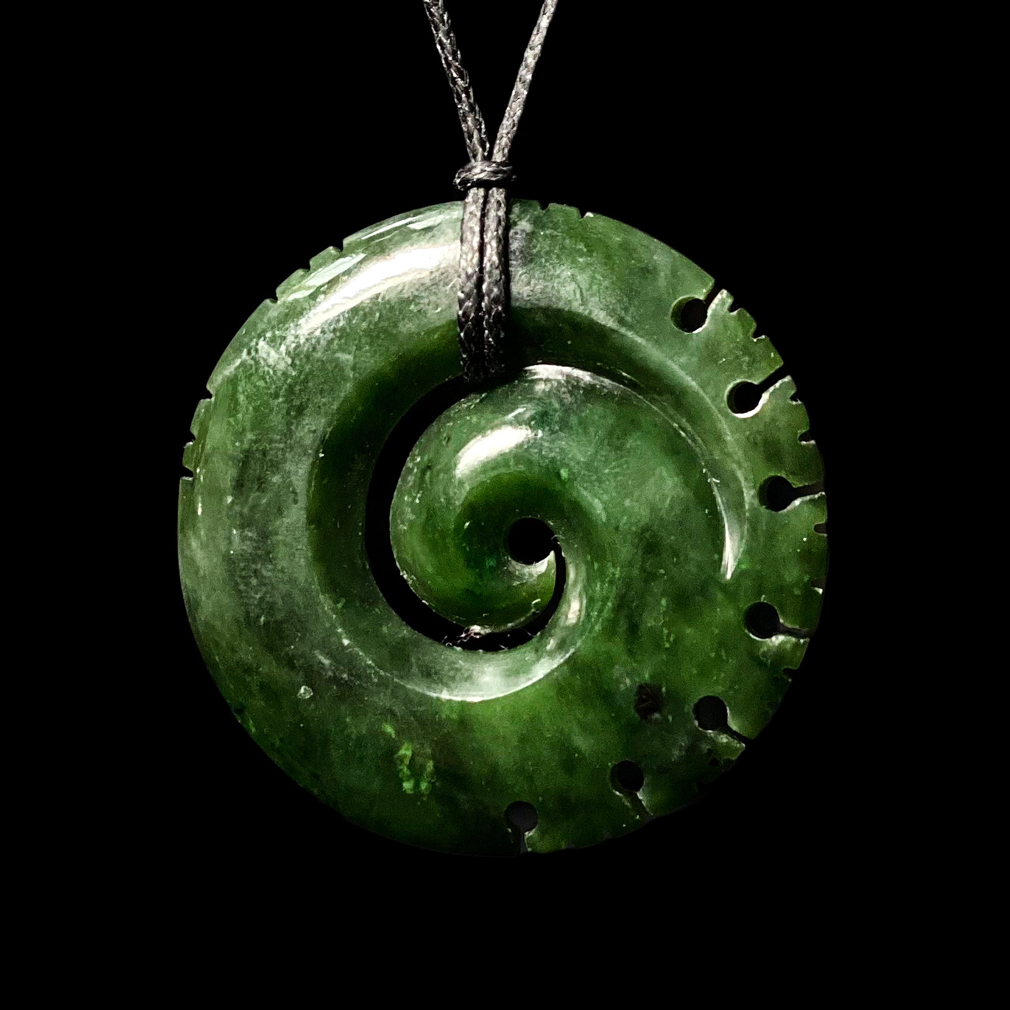 Pounamu notched Koru, handcrafted jade pendant-0