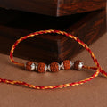 Rudraksha Silver Rakhi - Crafted Canvaas
