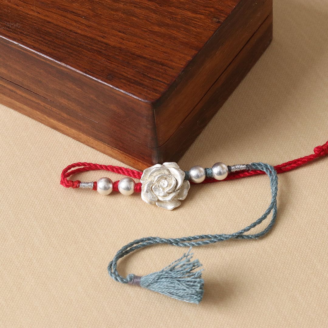 Sliver Rose Beads Rakhi - Crafted Canvaas
